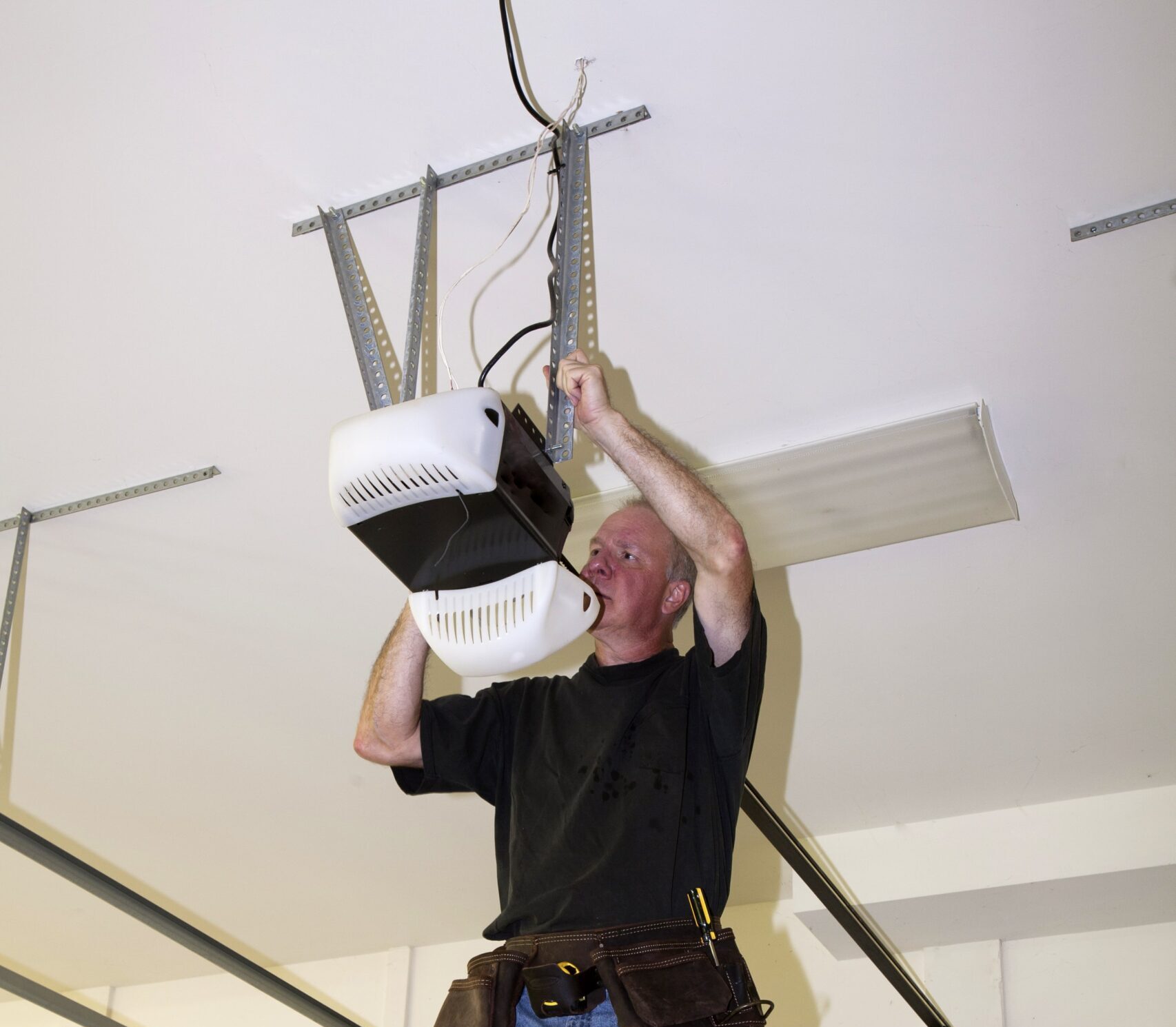 Garage door opener battery backup system